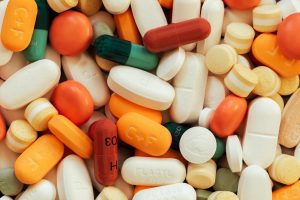 Jumbled colored prescription tablets